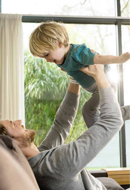 Boy and child playing inside
