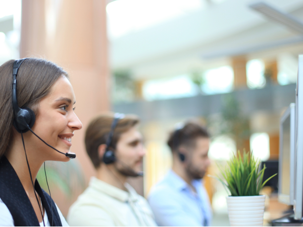 Customer service specialists helping customers